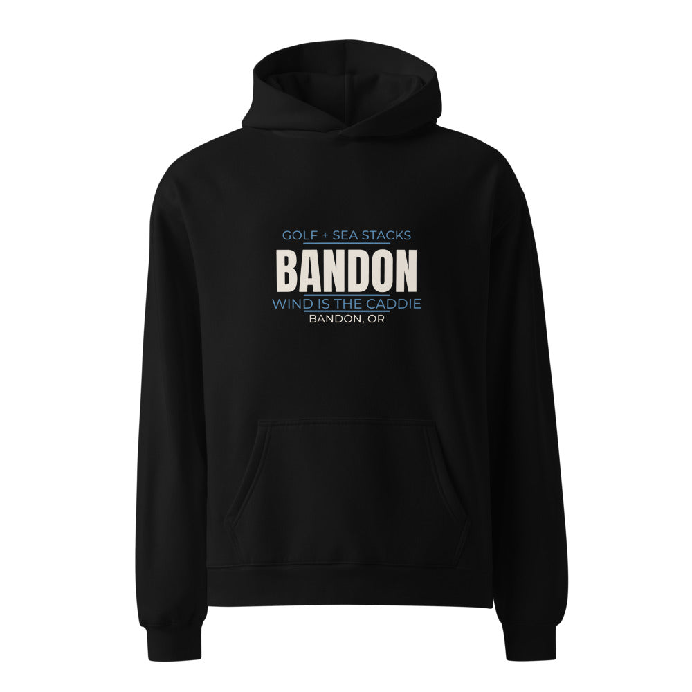 Black hoodie with Golf + Sea Stacks — Wind Is the Caddie Bandon print