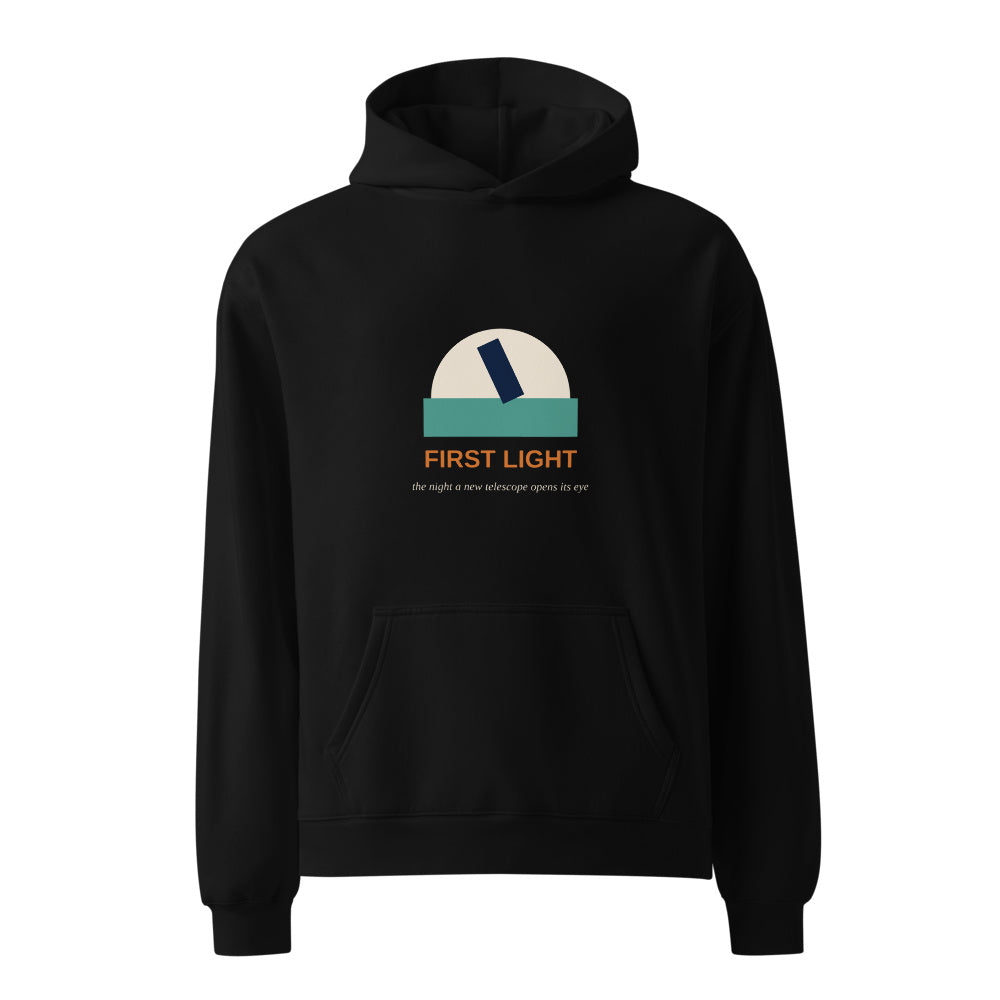 First Light black hoodie front in white studio | Kreativ