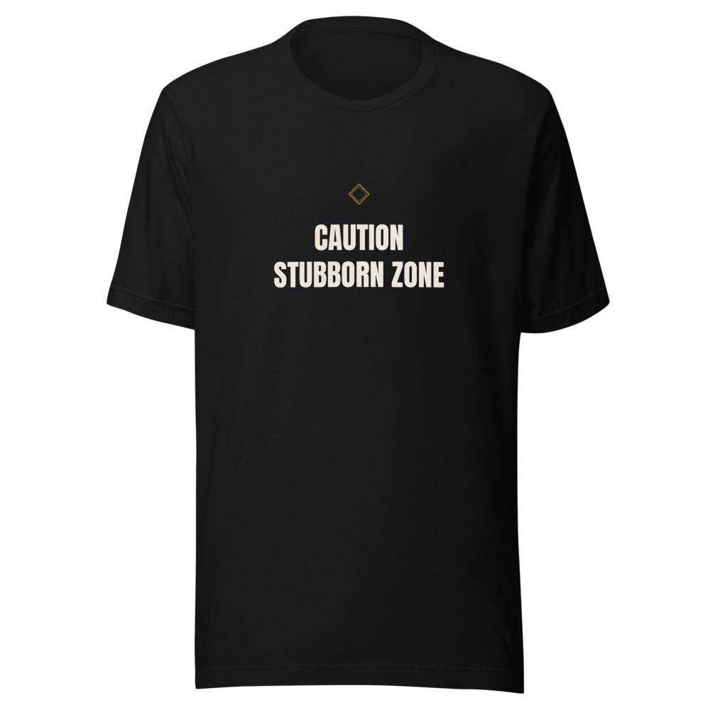 Tee that says Stubborn Zone Caution