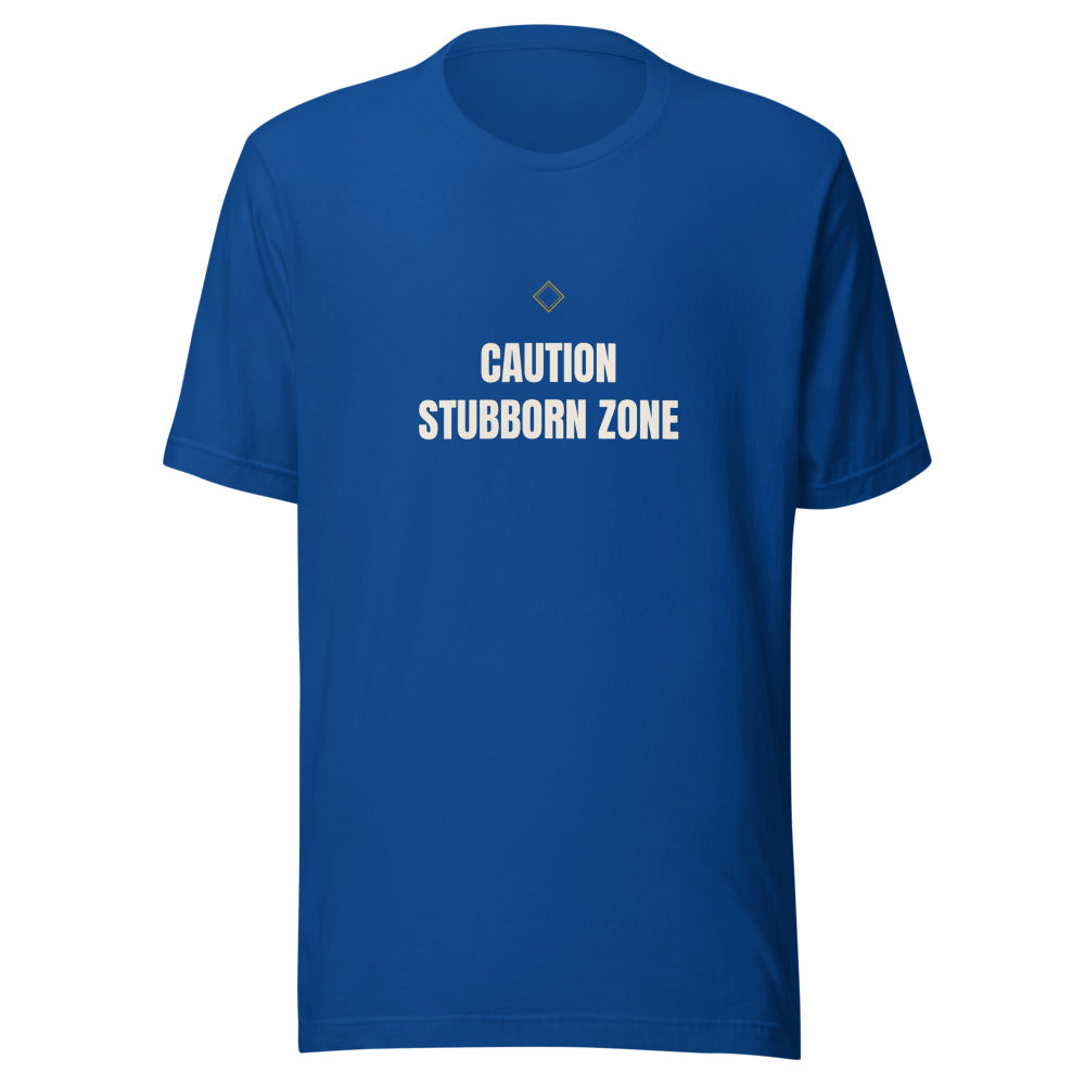 Tee that says Stubborn Zone Caution