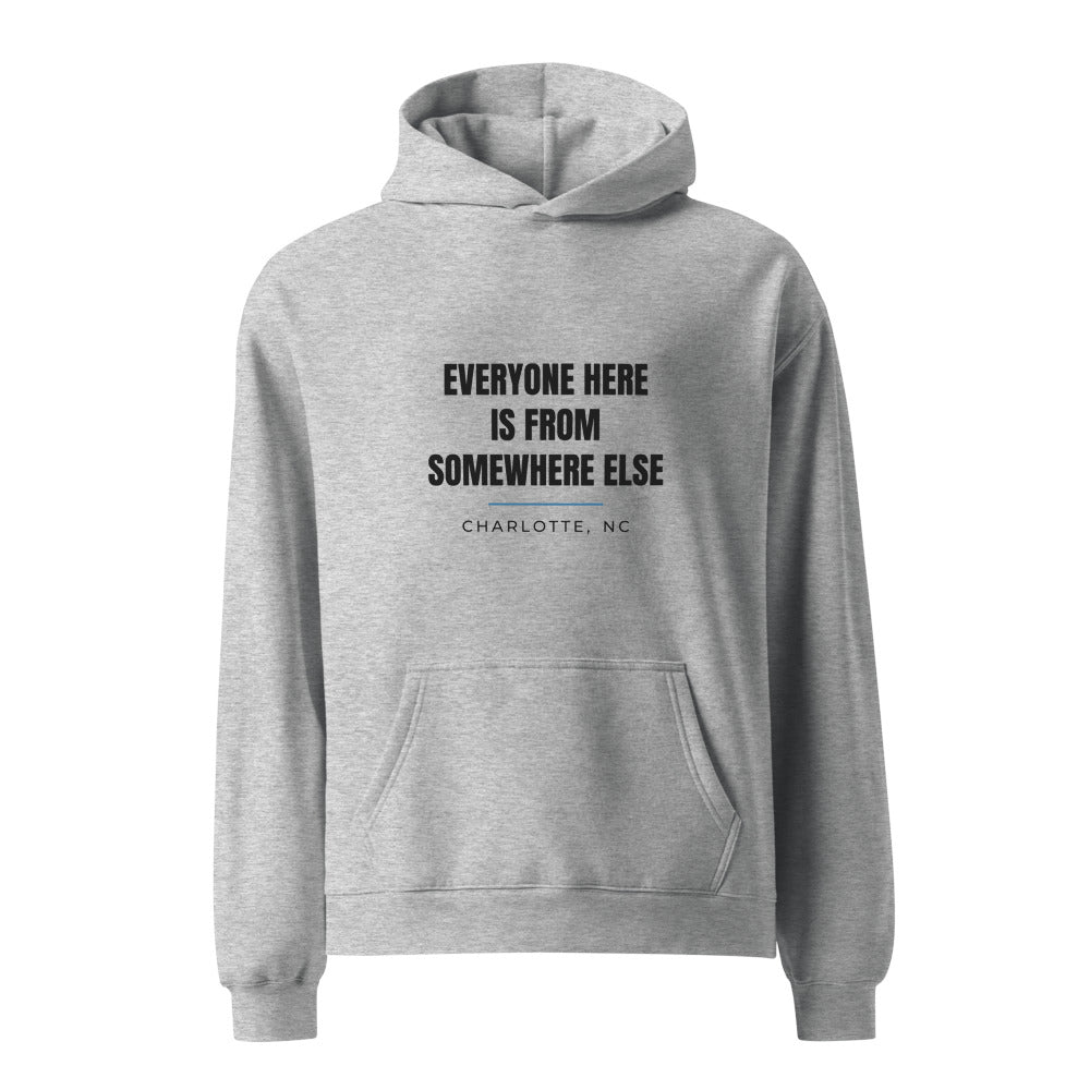 Charlotte hoodie that says Everyone Here Is From Somewhere Else.