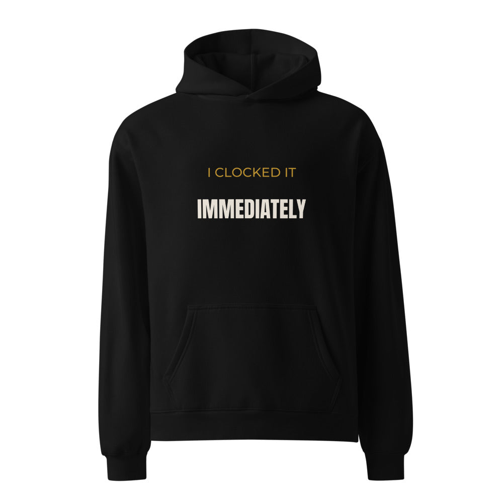 Black hoodie with I Clocked It Immediately slang statement print