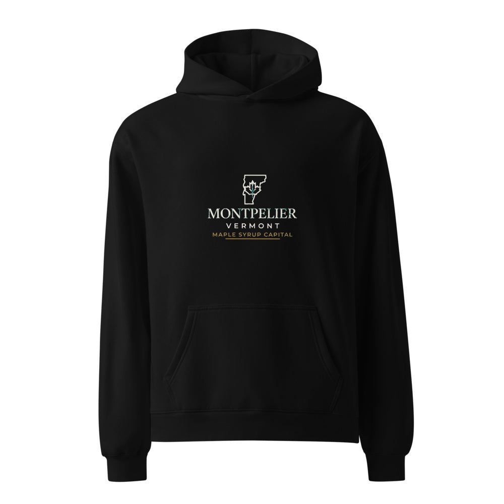 Montpelier Maple Syrup Capital black hoodie front in white studio | Kreativ